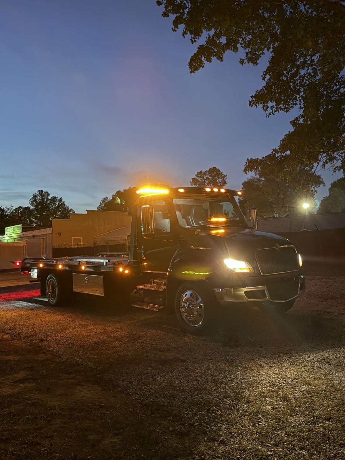 Ortma Towing flatbed tow truck serving Cary, NC